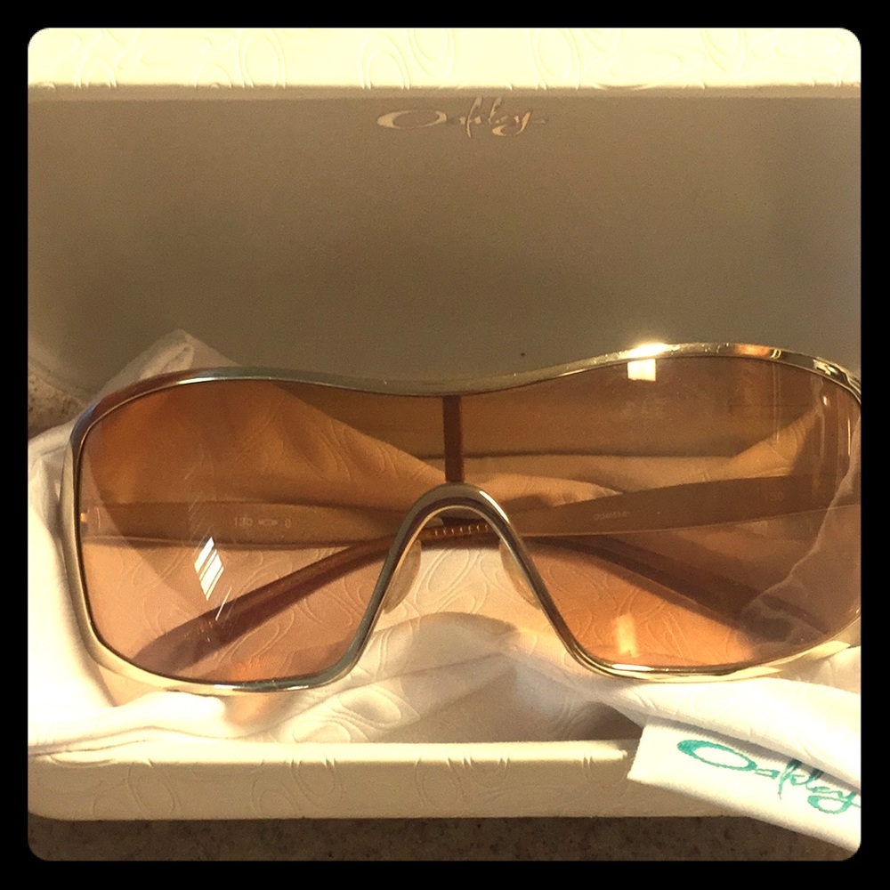 Oakley Sunglasses. Gold and Stylish.
